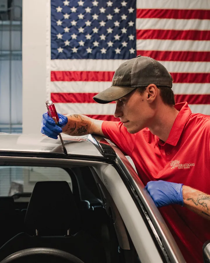 Generations Auto Glass technician installing a windshield